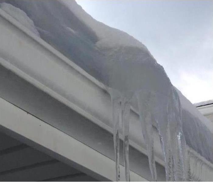 icicles hanging from roof edge