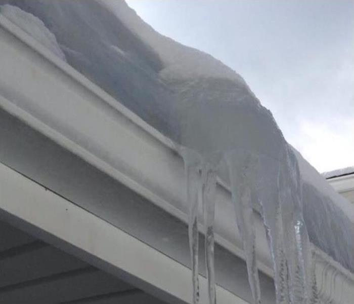 icicles at edge of roof