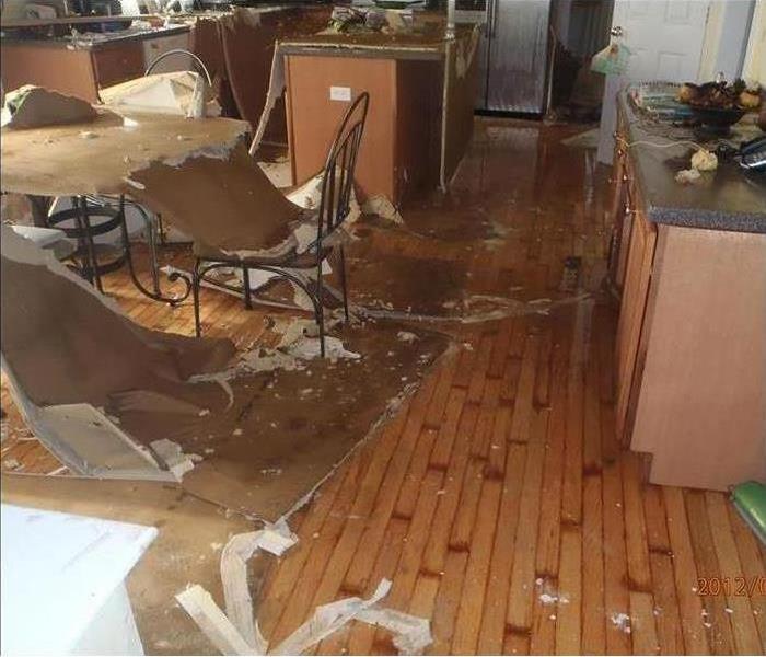 flood in kitchen with fallen ceiling