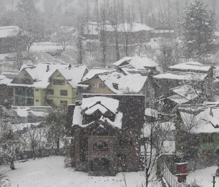 houses with heavy snowfall
