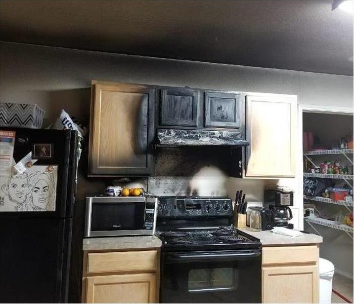 kitchen damaged by soot and smoke