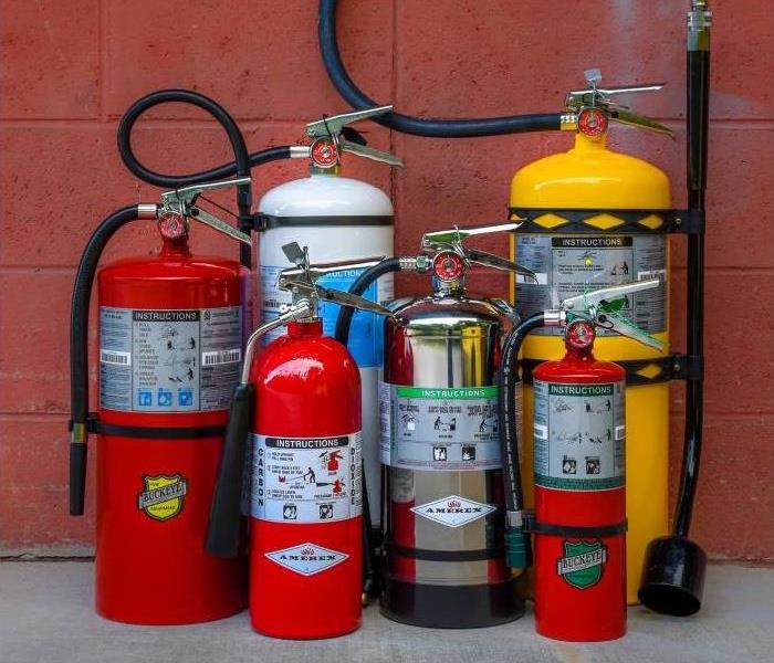 red and yellow fire extinguishers